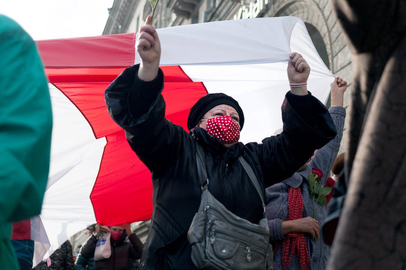 Women holding a flag