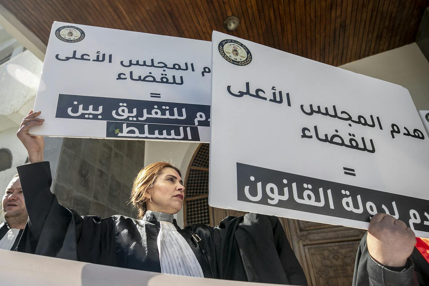 Members of the judiciary protest in Tunisia after the government arbitrarily dismissed 57 judges.