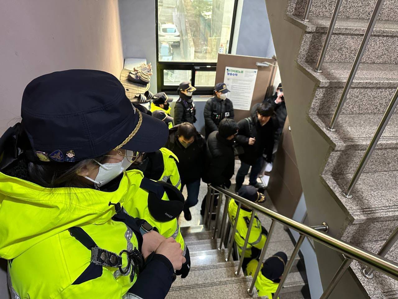 Security forces in South Korea raided nearly a dozen union offices